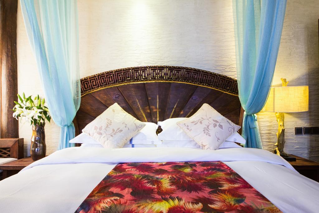 Lijiang Yuntian Palace Hotel Rom bilde