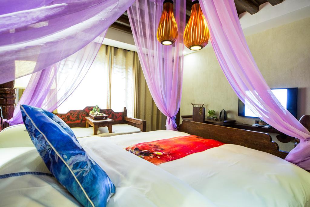 Lijiang Yuntian Palace Hotel Rom bilde